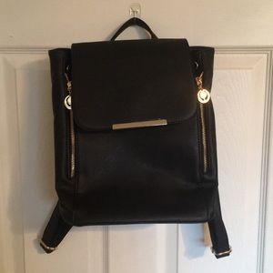 NWOT Black and Gold Faux Leather Backpack